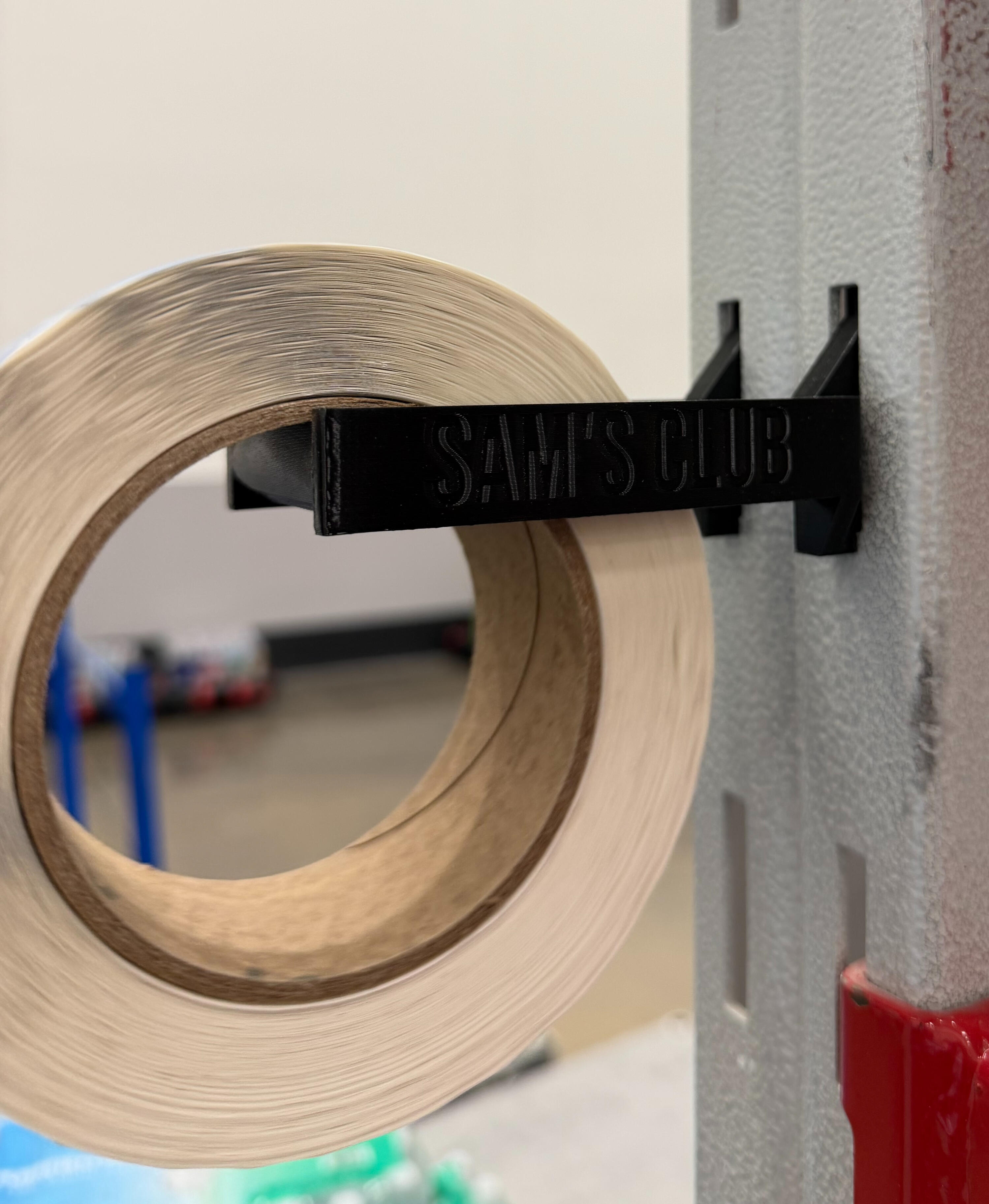 The holder installed on shelving with labels loaded