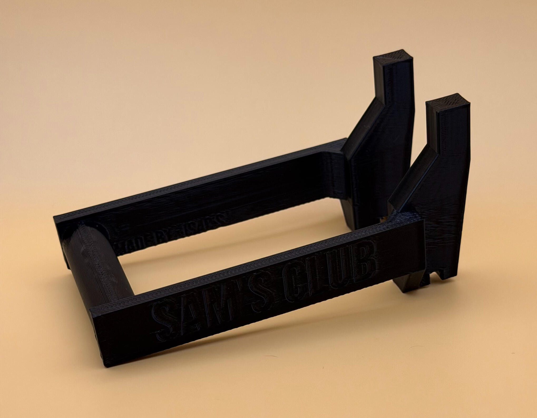 The holder installed on shelving with labels loaded